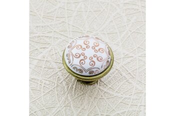 Möbelknopf J4, Zamak und Porzellan, Oberfläche: Altmessing, Motiv: orient gold