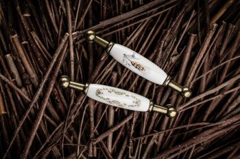 Möbelgriff 728B, BA 96 mm, Zamak und Porzellan, Oberfläche: Altmessing